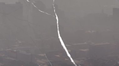 Animation of scratches changing over grey cityscape. Business, factory and industry concept digitally generated video.