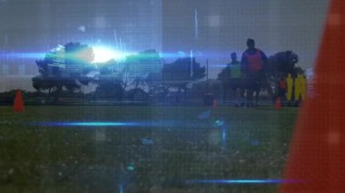 Animation of digital interface over football players. global connections, sports and competition concept digitally generated video.