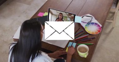 Animation of email icon with numbers over caucasian woman on laptop video call. Global social media, business, technology, data processing and digital interface concept digitally generated video.