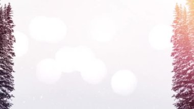 Animation of snow falling over trees in christmas winter landscape. Winter, christmas, tradition and celebration concept digitally generated video.