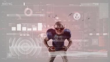 Animation of interface processing data over african american male american football player with ball. Sport, competition, technology and digital interface concept digitally generated video.