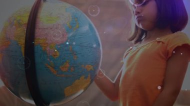Animation of network of connections over biracial schoolgirl with globe. global connections, education and digital interface concept digitally generated video.