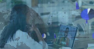 Animation of data processing over biracial businesswoman having laptop video call with colleague. Global business and digital interface concept digitally generated video.