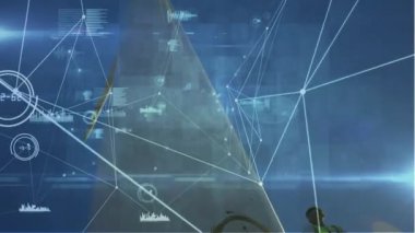 Animation of network of connections and data processing over male architect standing on a windmill. Global networking and renewable energy technology concept