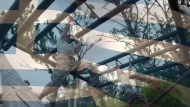 Animation of flag of greece orver diverse male soldiers during training. army, defense and patriotism concept digitally generated video.