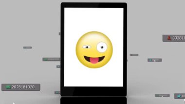 Animation of media and emoji icons over tablet. Social media and digital interface concept digitally generated video.