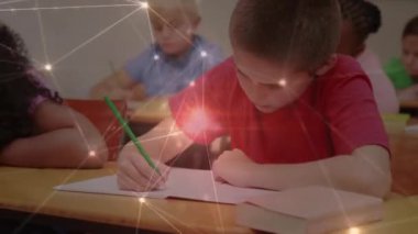 Animation of network of connections over caucasian boy in classroom. School, education, connections and network concept digitally generated video.