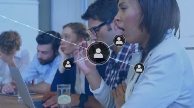 Animation of network of connections over diverse business people using laptop. Global cloud computing, technology, data processing and networks concept digitally generated video.