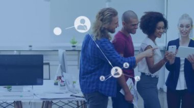 Animation of network of connections with icons over business people wearing phone headsets. Global business finances connections and digital interface concept digitally generated video.