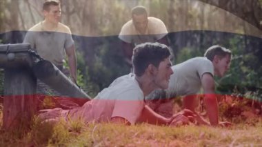 Animation of flag of russia over diverse male soldiers during training. army, defense and patriotism concept digitally generated video.