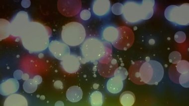 Animation of digital fire sparks moving in seamless loop against lens flare background. Burning, digitally generated, light, abstract and glowing concept.