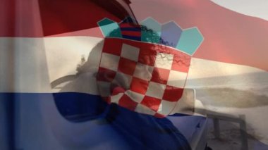Animation of croatia flag over thoughtful african american woman looking through vehicle window. Digital composite, contemplation, beach, wind, nature, vacation, patriotism and identity concept.