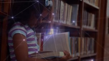 Animation of network of connections over african american girl with book at school. learning, education, connections and technology concept digitally generated video.