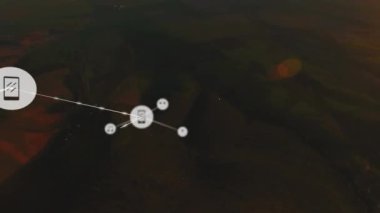 Animation of network of connections with icons over landscape. Global cloud computing, connections, data processing and digital interface concept digitally generated video.
