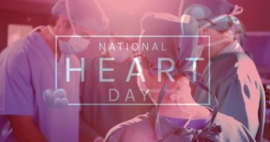 Animation of national heart day text over diverse surgeons. heart month and celebration concept digitally generated video.