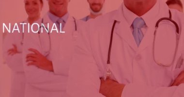 Animation of national heart day text over happy caucasian doctors. heart month and celebration concept digitally generated video.