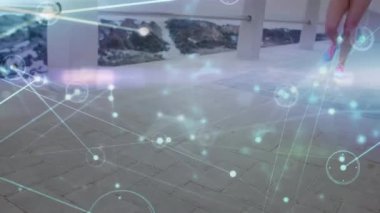 Animation of network lines connecting dots, caucasian woman doing stretch exercise on pier at beach. Digital composite, multiple exposure, connect the dots, wellbeing, fitness, healthy lifestyle.