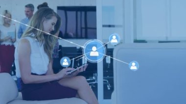 Animation of network of connections over caucasian businesswoman using tablet. Global cloud computing, technology, data processing and networks concept digitally generated video.