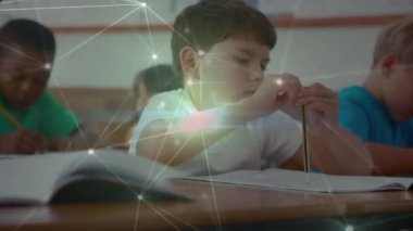 Animation of network of connections over caucasian boy in classroom. School, education, connections and network concept digitally generated video.