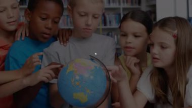 Animation of network of connections over diverse school children with globe. global connections, education and digital interface concept digitally generated video.