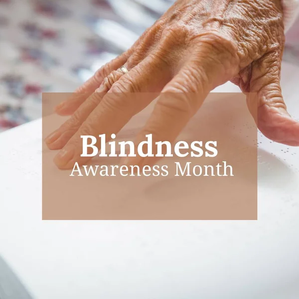 Composition of blindness awareness month text over hand reading braille. Blindness awareness month and celebration concept digitally generated image.