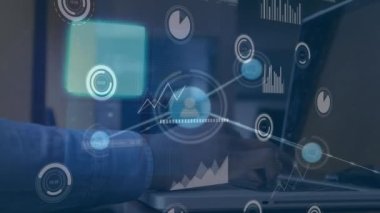 Animation of profile icons, graph data over caucasian businessman working with laptops in office. Digital composite, multiple exposure, business, technology, connect the dots, networking.