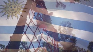 Animation of flag of argentina over diverse woman and man during obstacle race training. national sports, activity and patriotism concept digitally generated video.