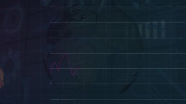 Animation of clock and data processing over african american male football player with ball on pitch. Sports, competition, computing and data processing concept digitally generated video.