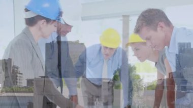 Animation of diverse business people over building site. global business, computing and digital interface concept digitally generated video.