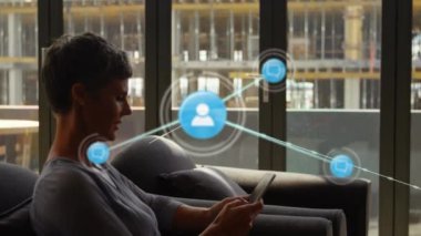 Animation of network of connections over thoughtful caucasian woman using smartphone. global business, connections and technology concept digitally generated video.