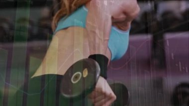 Animation of interface processing data over caucasian woman weight training in gym. Sport, fitness, technology and digital interface concept digitally generated video.