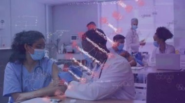 Animation of dna structure with doctor in face mask vaccinating nurse in clinic during pandemic. Healthcare, medical professional, computer graphic, pandemic, protection, covid-19.