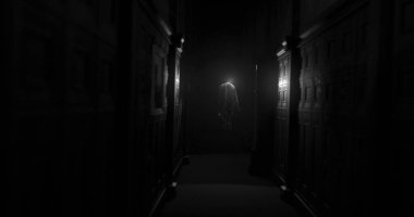 Image of moving ghost and buildings on black background. Halloween and ghosts concept digitally generated image.