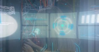 Animation of interface with data processing over caucasian female engineer working at server room. Computer interface and business data storage technology concept