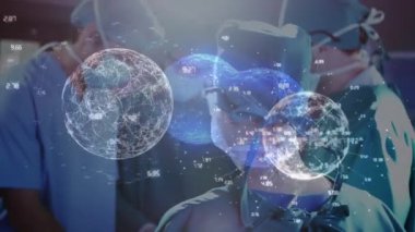 Animation of globes over diverse surgeons with face masks. Global medicine and digital interface concept digitally generated video.