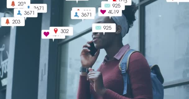 Animation Multiple Social Media Icons African American Woman Talking Smartphone — Stok video