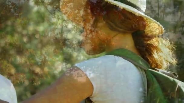 Composite Video African American Woman Wearing Hat Smiling Tall Trees — Vídeo de Stock