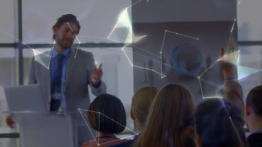 Animation of globe over diverse business people in office. Global business and digital interface concept digitally generated video.