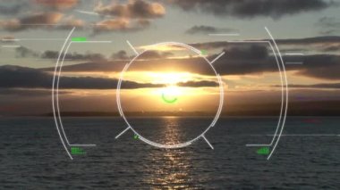 Animation of circular interface rotating over scenic view of seascape and horizon against sky. Digital composite, multiple exposure, data, scanning, sunset, nature and scenery concept.