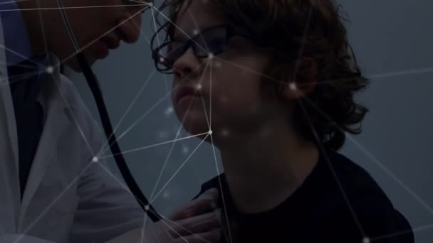 Animation Dots Interconnecting Lines Asian Doctor Examining Boy Stethoscope Digital — Stock Video