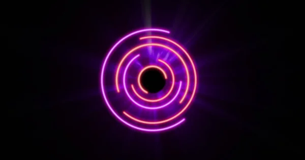 Image Glowing Pink Purple Circles Black Background Colour Movement Concept — Stockfoto