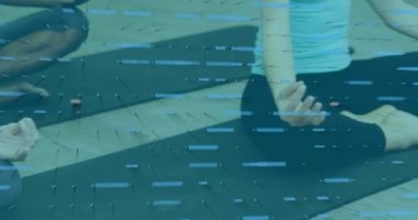 Animation of financial data processing over group of diverse fit women practicing yoga at the gym. Sports and fitness technology concept