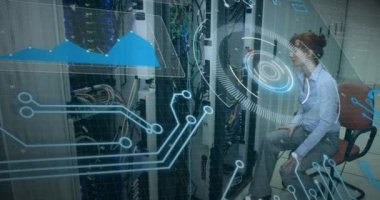 Animation of interface with data processing over caucasian female engineer working at server room. Computer interface and business data storage technology concept