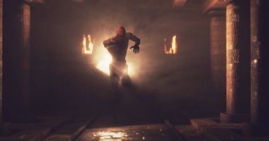 Image of scary zombie mummy walking around in dark crypt room with burning torches. Halloween fear, horror and suspense concept digitally generated image.