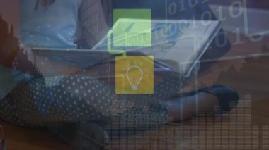 Animation of network of digital icons over caucasian girl reading a book at school. School and education technology concept