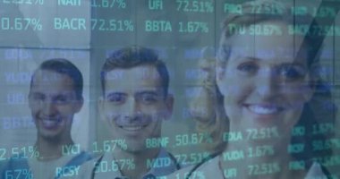Animation of stock market data processing over team of male and female health workers smiling. Medical healthcare and technology concept