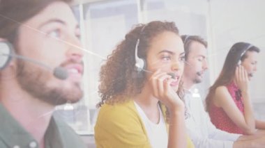 Animation of network of profile icons over diverse male and female customer care executives working. Global networking and business technology concept