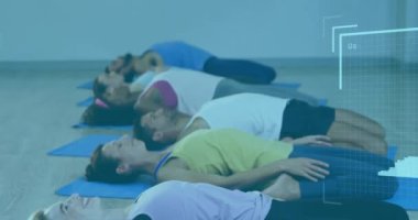 Animation of profile icons over group of diverse fit people performing stretching exercise at gym. Sports and fitness technology concept