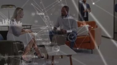 Dots and graphs connecting with lines over diverse coworkers with laptop and coffee shaking hands. Animation, digital composite, teamwork, drink, business, office, partnership, technology concept.