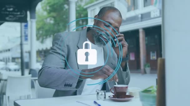 Animation Padlock Circles African American Man Talking Cellphone Mixing Coffee — Wideo stockowe